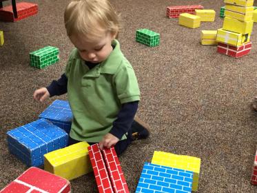 Toddler Playing with Blocks