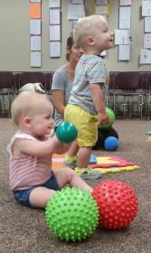 Toddlers Playing with Balls