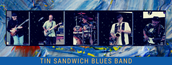 Image of Tin Sandwich Band members performing on stage.