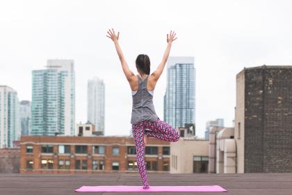 girl yoga rooftop