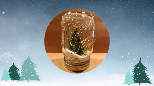 Image of a mason jar snow globe craft with winter trees.