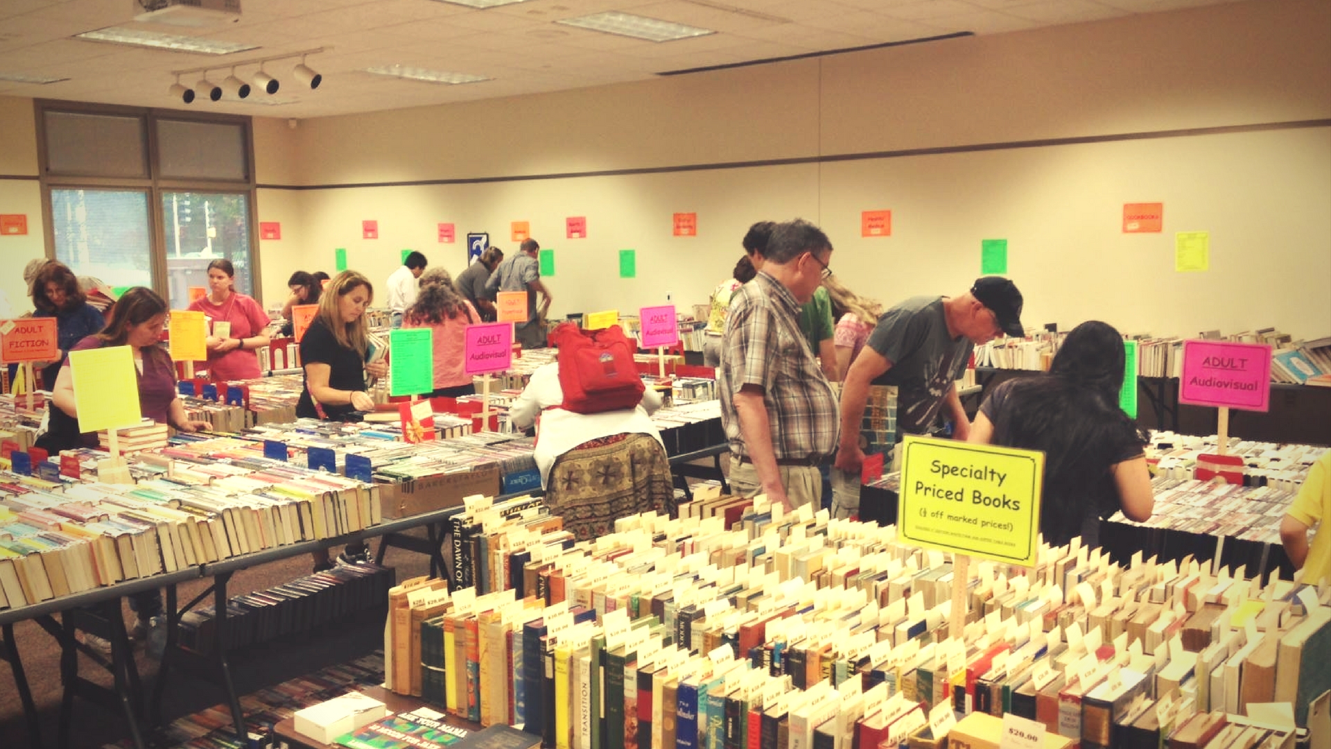 book sale room with people