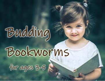 girl reading book outside